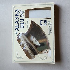 Alaska Ulu knife with display stand. Original made in Anchorage by Ulu Factory